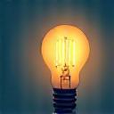 Ikon inovasi berupa bola lampu menyala